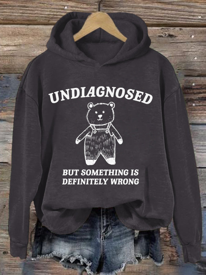 Damen Kapuzenpullover mit Aufdruck „Undiagnosed But Something Is Definitively Wrong“